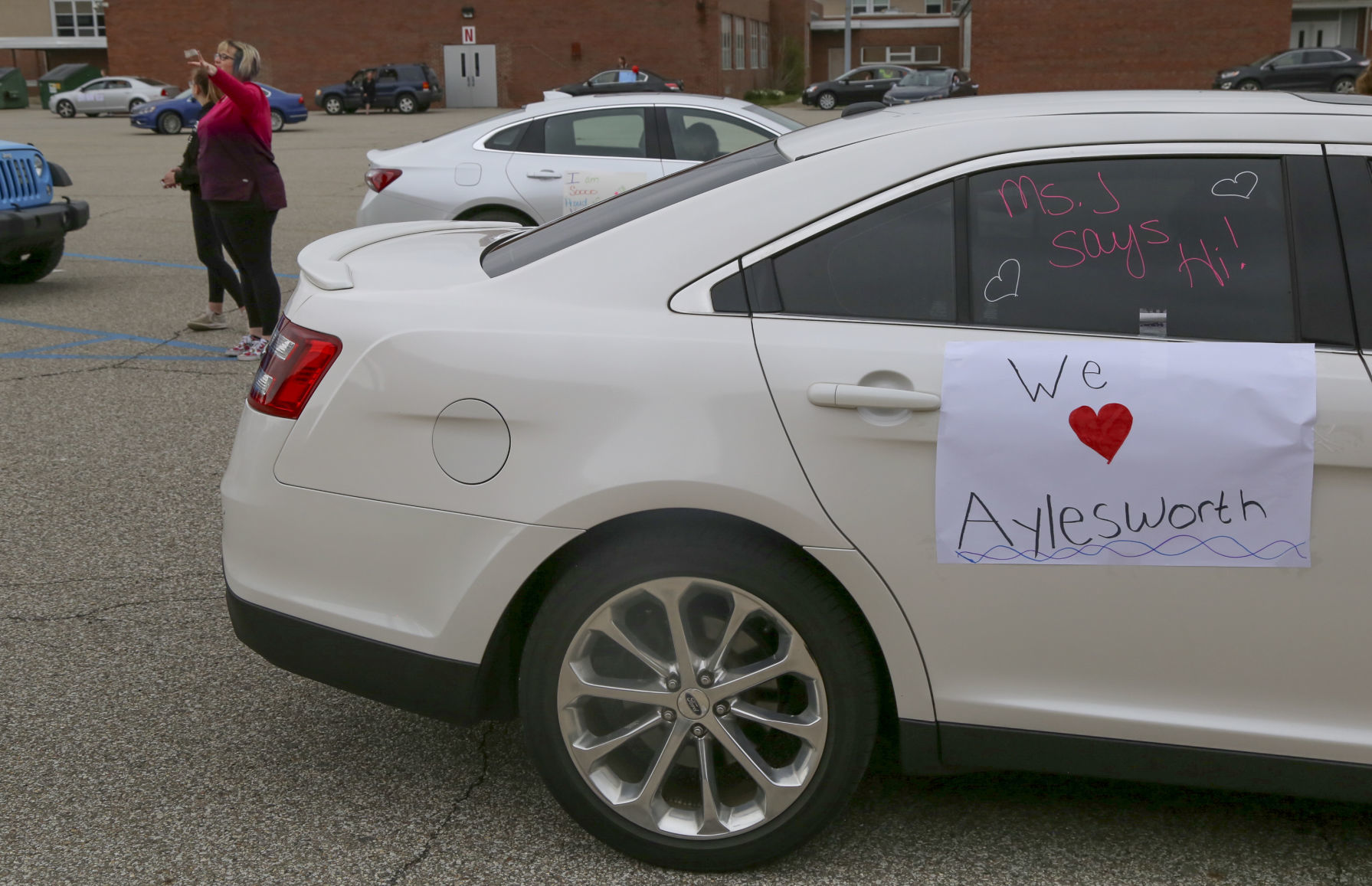 Aylesworth Elementary School in Portage teachers and staff parade through the neighborhoods in their district